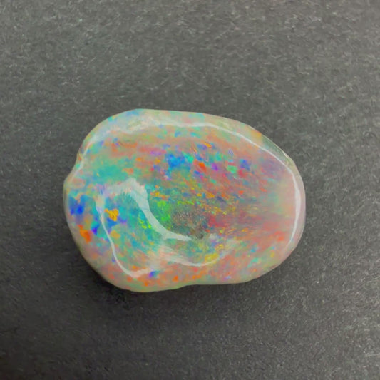 2.06cts Dark Opal Carving With A Red Pink Multicolor Play Of Color, From Lightning Ridge Australia