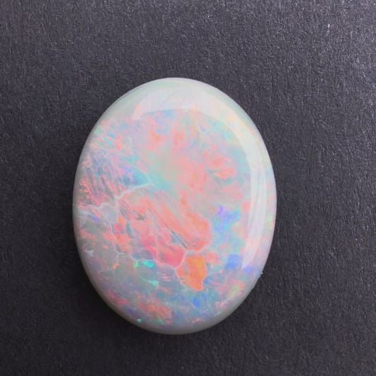5.39cts Dark Opal With A Red Pink Multicolor Play Of Color, From Lightning Ridge Australia