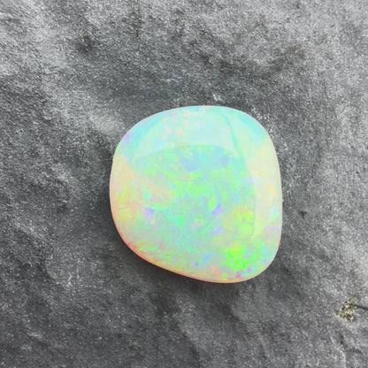 0.96cts Affordable Crystal Opal With A Green Yellow Gold Play Of Color, From Lightning Ridge Australia