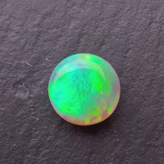 1.10ct Crystal Opal With A Green, Yellow, Gold Play Of Color, From Lightning Ridge Australia