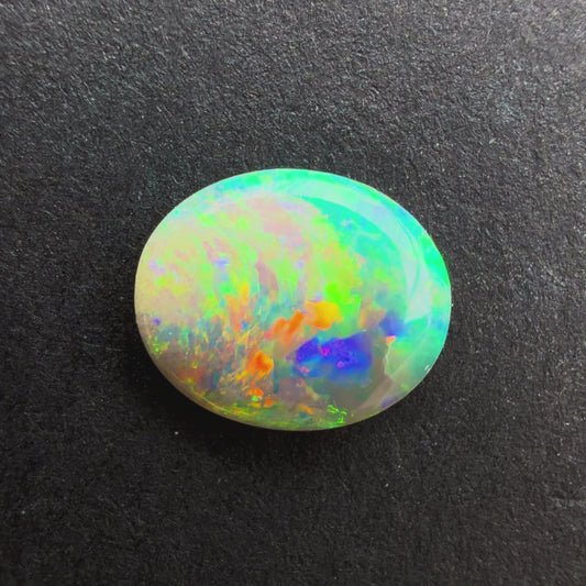 0.64cts Affordable Crystal Opal With A Green Blue Multicolor Play Of Color, From Lightning Ridge Australia