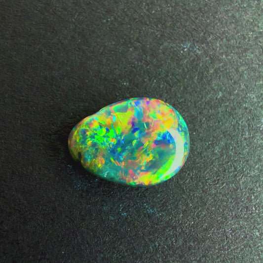 0.46cts Black Opal With A Red Pink Multicolor Play Of Color, From Lightning Ridge Australia