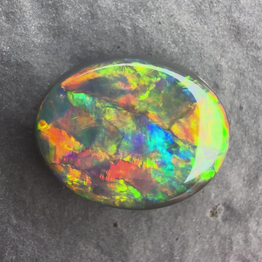 4.33cts Gem Black Opal With A Beautiful Red Multicolor Play Of Color, From Lightning Ridge Australia