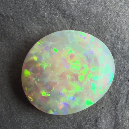 1.5cts Affordable Crystal Opal With A Beautiful Green Yellow Gold Pattern