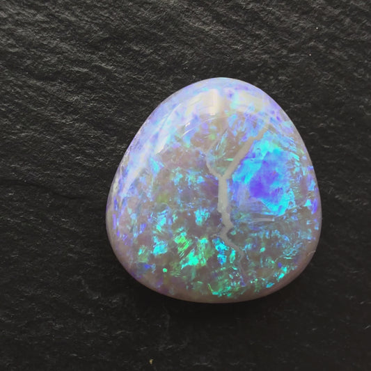9.4ct Dark opal with a Freckled Blue Green Pattern
