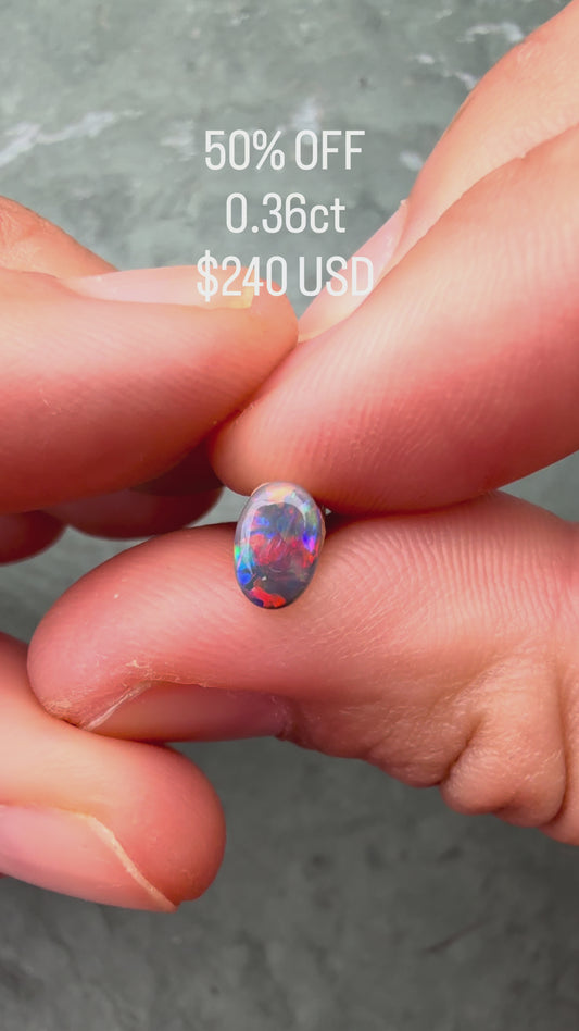 0.36ct Black Opal With A Red, Pink Multicolor Play Of Color, From Lightning Ridge Australia