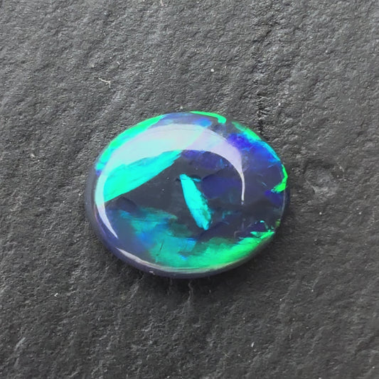 1.38ct Black Crystal Opal With A Green, Blue Play Of Color, From Lightning Ridge Australia