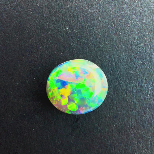 0.75cts Dark Opal With A Green, Yellow, Gold Multicolor Play Of Color, From Lightning Ridge Australia