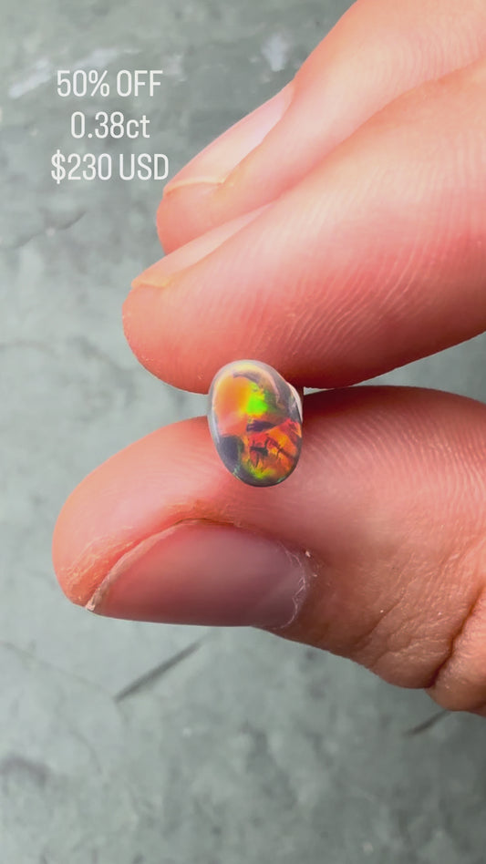 0.38ct Black Opal With A Red, Pink Multicolor Play Of Color, From Lightning Ridge Australia