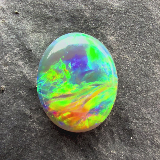 0.69cts Gem Crystal Opal With Green Yellow Gold Pattern