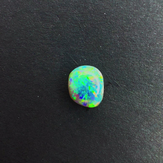 0.55cts Dark Crystal Opal With A Green Blue Multicolor Play Of Color, From Lightning Ridge Australia