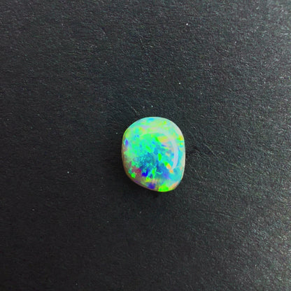 0.55cts Dark Crystal Opal With A Green Blue Multicolor Play Of Color, From Lightning Ridge Australia