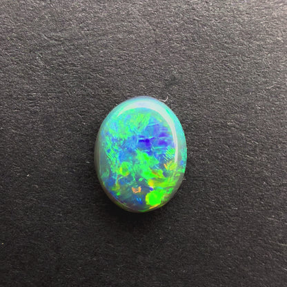 0.58cts Affordable Black Opal With A Green Blue Play Of Color, From Lightning Ridge Australia