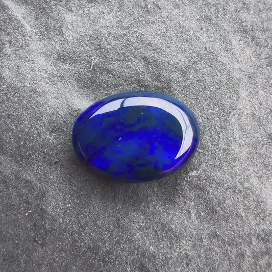 0.9cts Affordable Black Opal With A Deep Blue Play of color