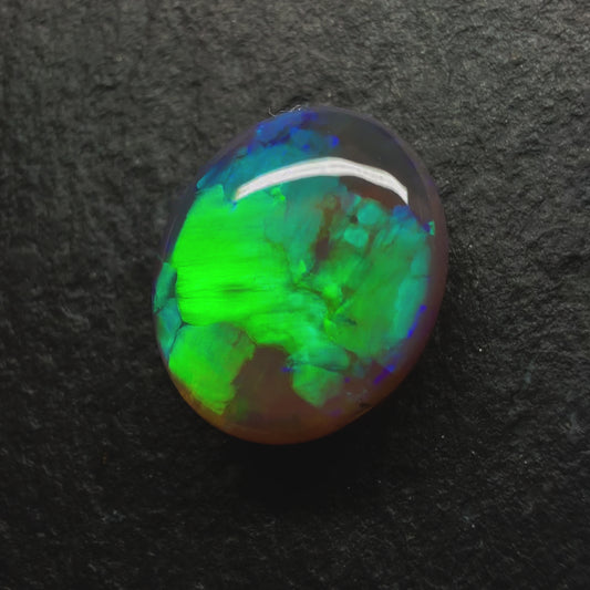 2.27ct Gem Black Crystal Opal, This Gem Has a Vivid Green-Blue Blocky Pattern, Lots of Depth And A Honey Like Glow From Within The Stone