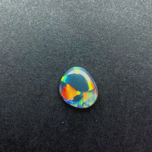 0.62cts Affordable Dark Opal With A Red Pink Multicolor Play Of Color, From Lightning Ridge Australia