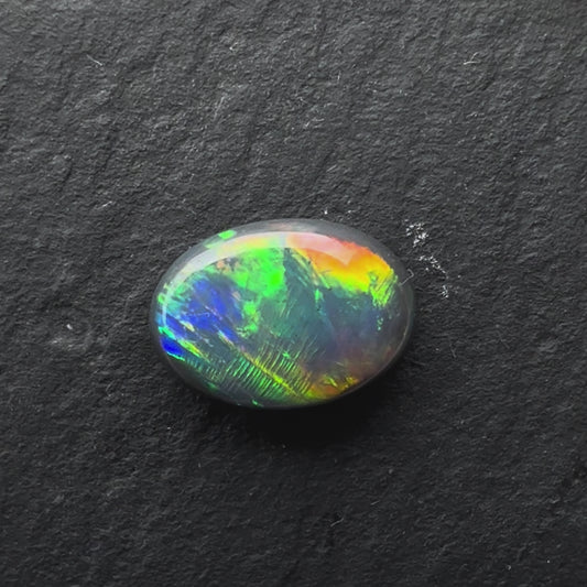 1.00cts Black Opal With A Green, Yellow. Gold Play Of Color, From Lightning Ridge Australia