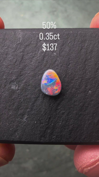 0.35ct Black Opal With A Red, Pink Multicolor Play Of Color, From Lightning Ridge Australia