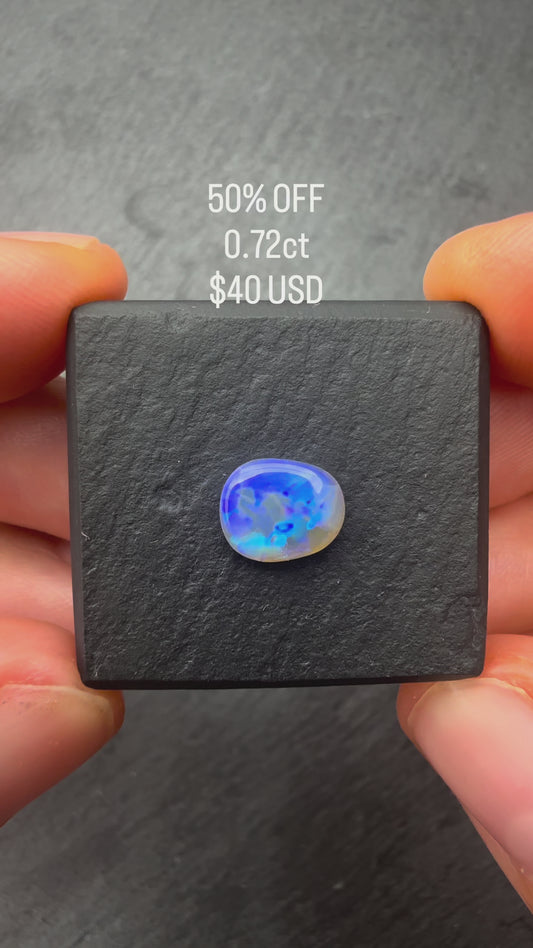 0.72ct Crystal Opal With A Purple, Violette Play Of Color, From Lightning Ridge Australia
