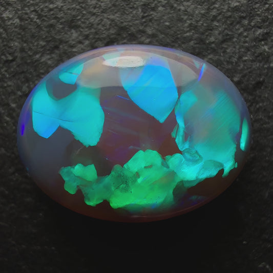 4.65ct Black Crystal Opal, This Gem Has Soft Glowing Minty Blues And Greens And A Very Unique Pattern