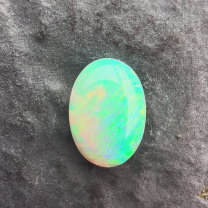 0.76cts Affordable Crystal Opal With A Green Yellow Gold Play Of Color, From Lightning Ridge Australia