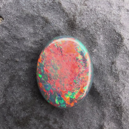 0.81ct Gem Black Opal With A Vivid Red Pink Multicolor Play Of Color, From Lightning Ridge Australia