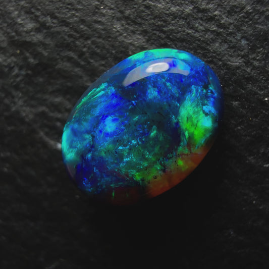 0.88ct Black Opal, This Gem Has A Dark Blue-Green Color Palette With A Mossy Pattern