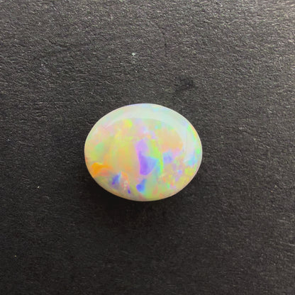 0.7cts Affordable Dark Opal With A Red Pink Multicolor Play Of Color, From Lightning Ridge Australia