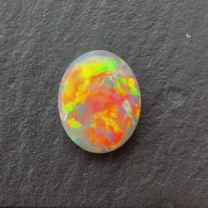 1.31ct Crystal Opal With A Red, Pink, Multicolor Play Of Color, From Lightning Ridge Australia