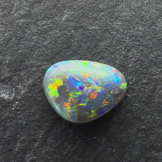 0.69cts Black Opal With A Red Pink Multicolor Play Of Color, From Lightning Ridge Australia