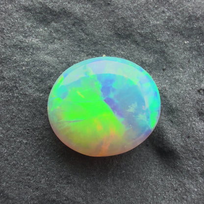 0.54cts Affordable Gem Crystal Opal With A Green Blue Pattern