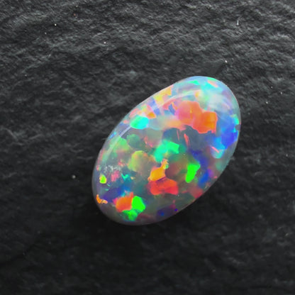 0.49ct Top Gem Black Opal With Rare Red-Blue floral Pattern