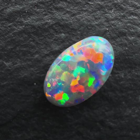 0.49ct Top Gem Black Opal With Rare Red-Blue floral Pattern