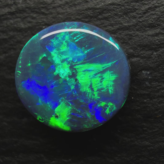 2.59ct Black Opal With ABlue Green Color Palette And A Flagstone Like Pattern