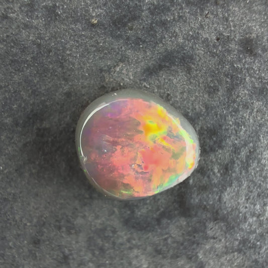 0.66cts Dark Opal With A Beautiful Mixed Red Pink Multicolor Pattern