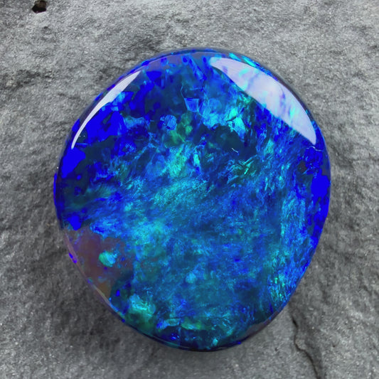 6.85cts Gem Black Opal With A Deep Blue And Green Pinfire Pattern