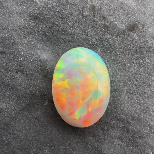 0.65cts Affordable Dark Opal With A Green, Yellow, Gold Play Of Color, From Lightning Ridge Australia