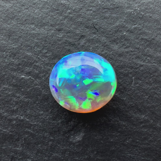 0.88cts Crystal Opal With A Green, Blue Play Of Color, From Lightning Ridge Australia