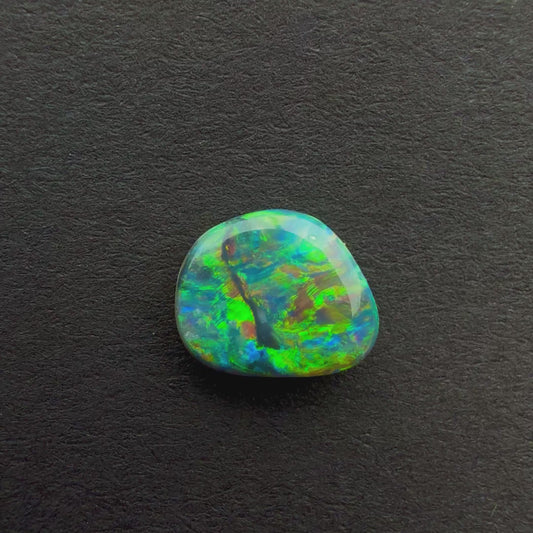 0.73cts Black Opal With A Green Blue Play Of Color, From Lightning Ridge Australia