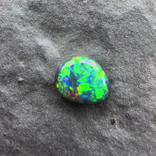 0.26cts Top Gem Micro Black Opal With A Green Yellow Gold Pattern