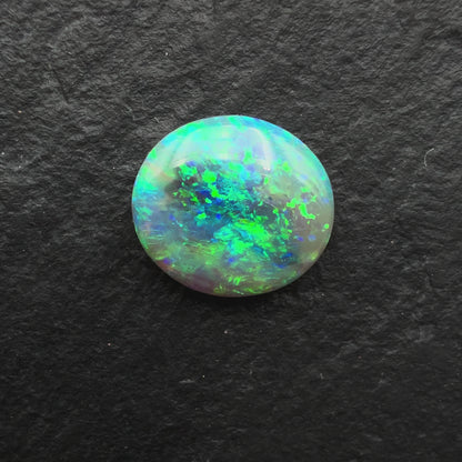 1.28cts Affordable Dark Opal With A Speckled Blue Green Pattern