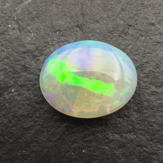 1.1ct Affordable Dark Crystal Opal With A Vivid Yellow Catseye