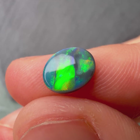 0.64cts Black Opal With A Green, Yellow, Gold Play Of Color, From Lightning Ridge Australia