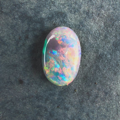 0.75cts Gem Dark Opal With A Beautiful Mixed Red Pink Multicolor Pattern