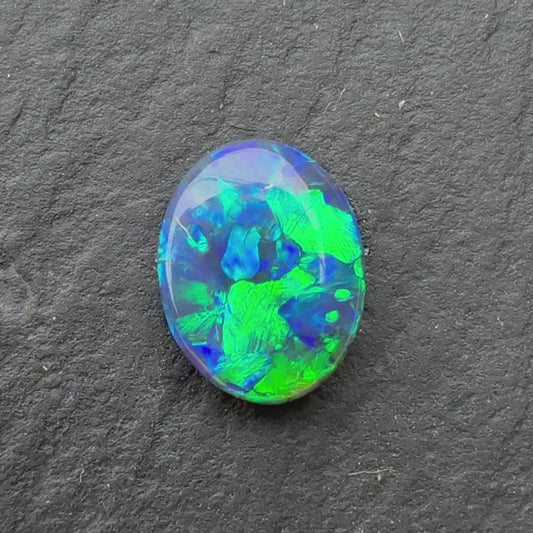 0.62ct Black Opal With A Blue, Green Play Of Color, From Lightning Ridge Australia