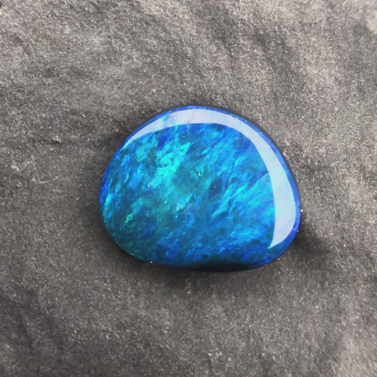 0.48cts small Affordable Black Opal With A Green Blue Palette