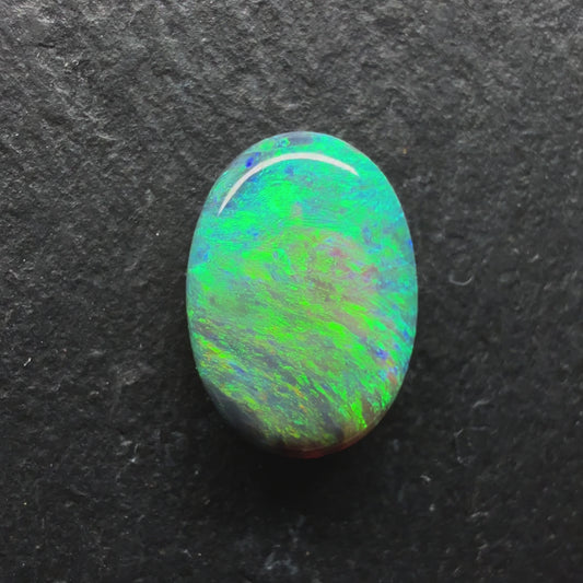 Dark Crystal Opal With A Vivid Green-gold Color Palette and an Attractive moss Pattern