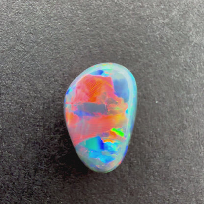 0.73cts Black Opal With A Red Pink Multicolor Play Of Color, From Lightning Ridge Australia