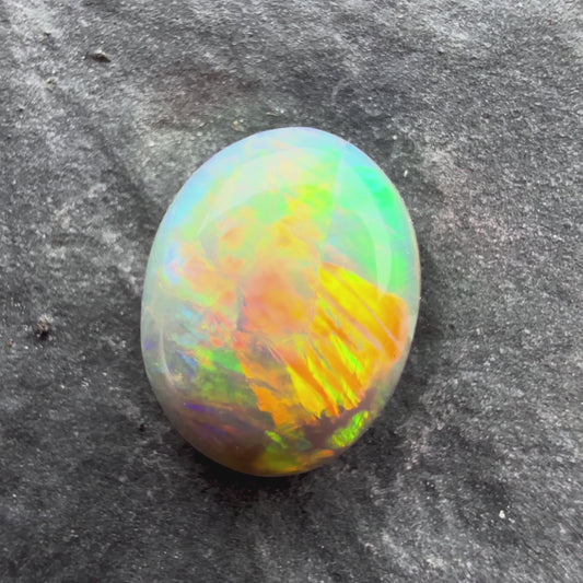 0.71cts Gem Crystal Opal With Green Yellow Gold Pattern