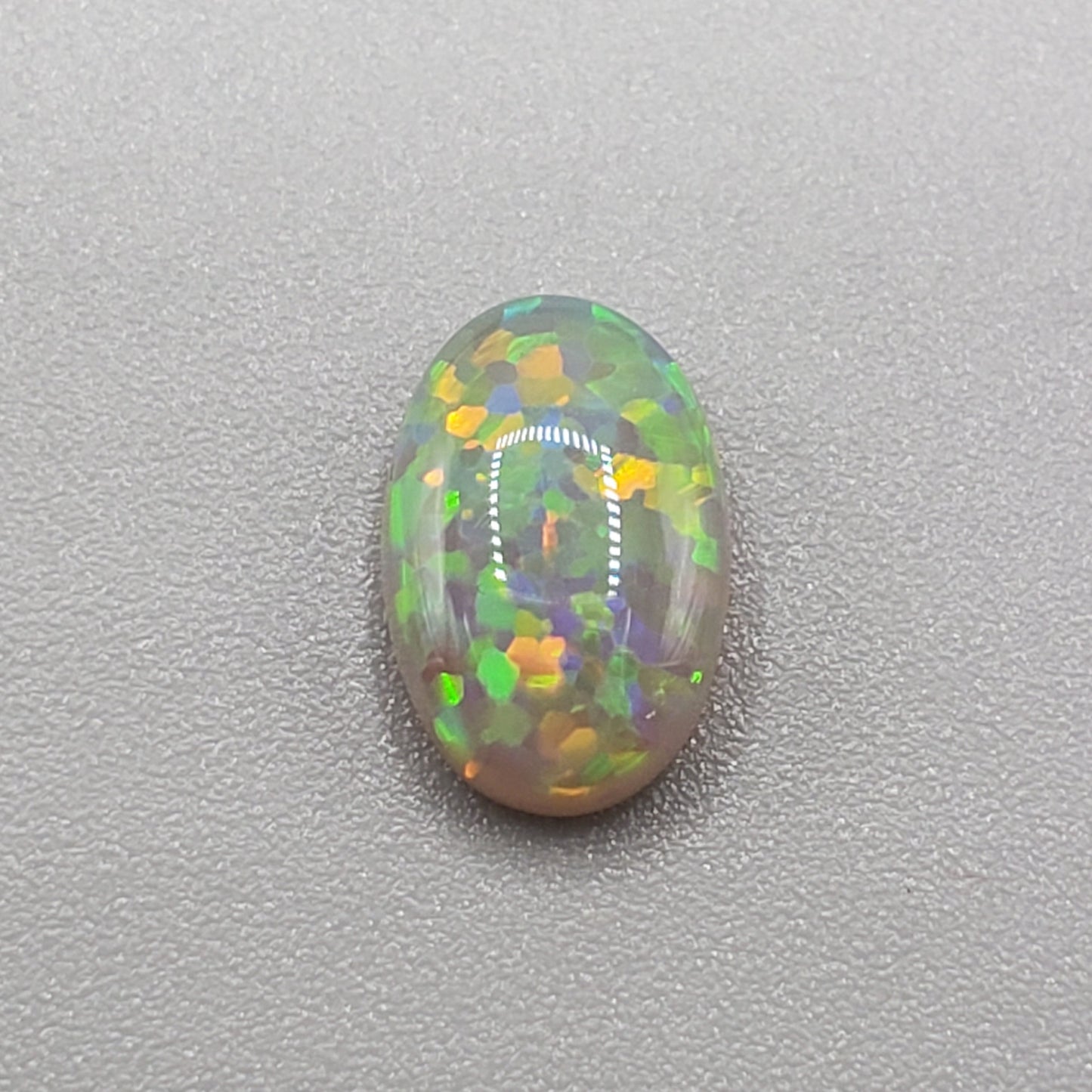 1.4cts Dark opal with a Green- Gold full facing floral pattern